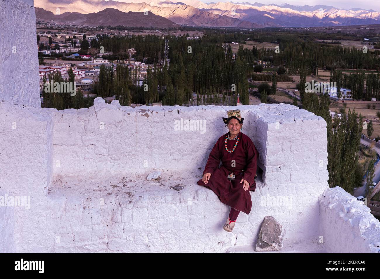 Elderly man in traditional Ladakhi clothes, Spituk Monastery (Gompa), Leh district, Ladakh, India Stock Photo