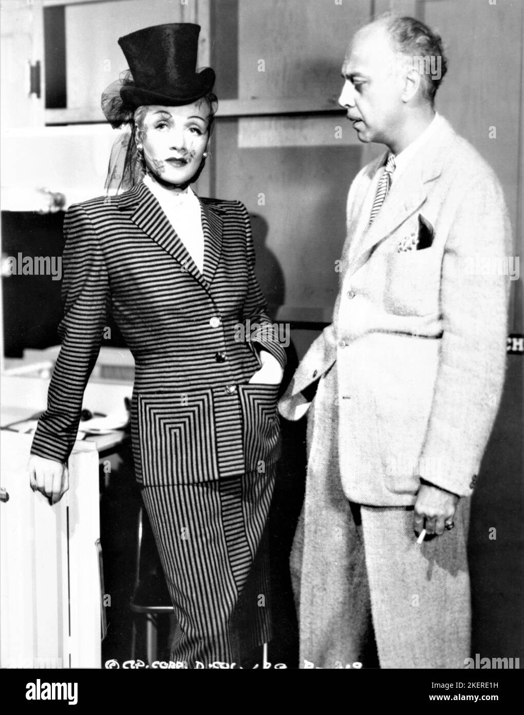 MARLENE DIETRICH and Director MITCHELL LEISEN on set candid during