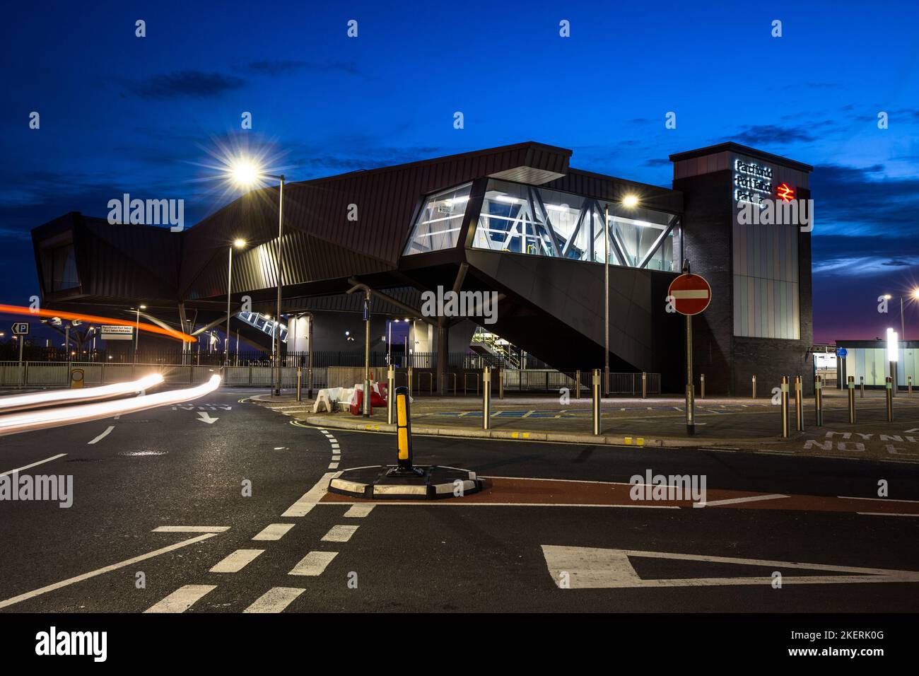 Exterior shot of Port Talbot Parkway Station with the A48 in the foreground. The station ticket office and bridge was rebuilt during 2015/2016 Stock Photo