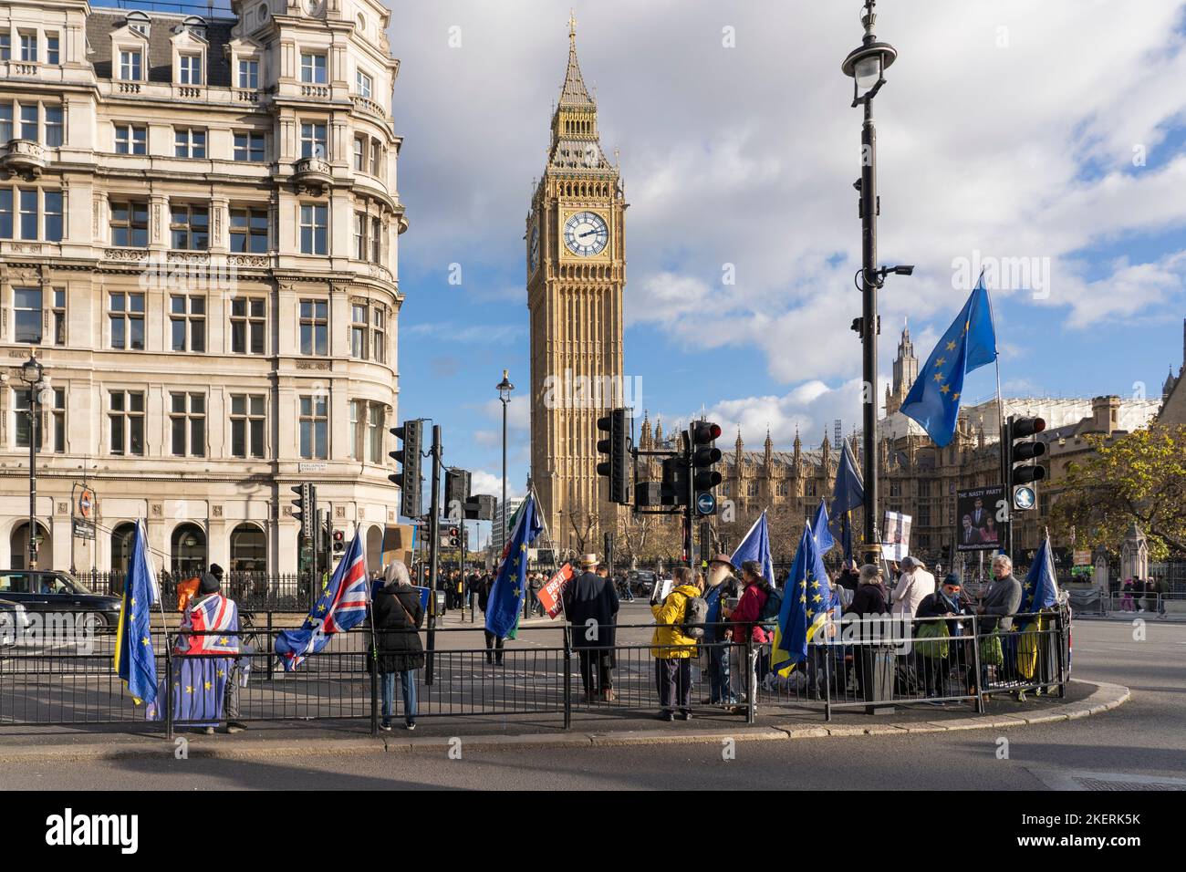 A protest group near the Houses of Parliament and Big Ben, protesting against the Tory Party and Brexit, 9th Nov 2022. London, England Stock Photo