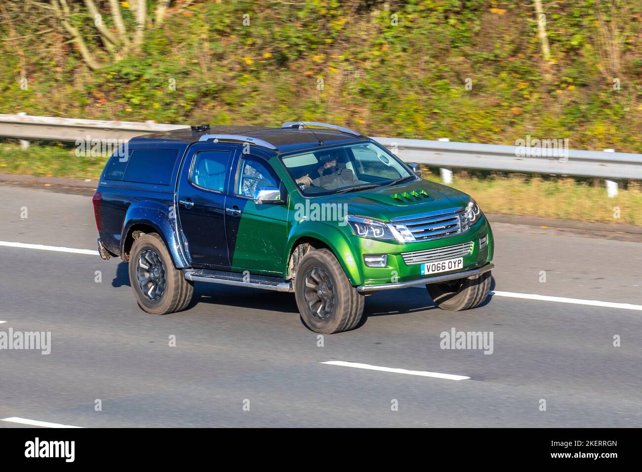2016 Green Black ISUZU D-MAX TD EIGER DCB 2489cc 5 Speed manual, 2.5 TD Double Cab Pickup 4x4 4dr travelling on the M6 motorway, UK Stock Photo