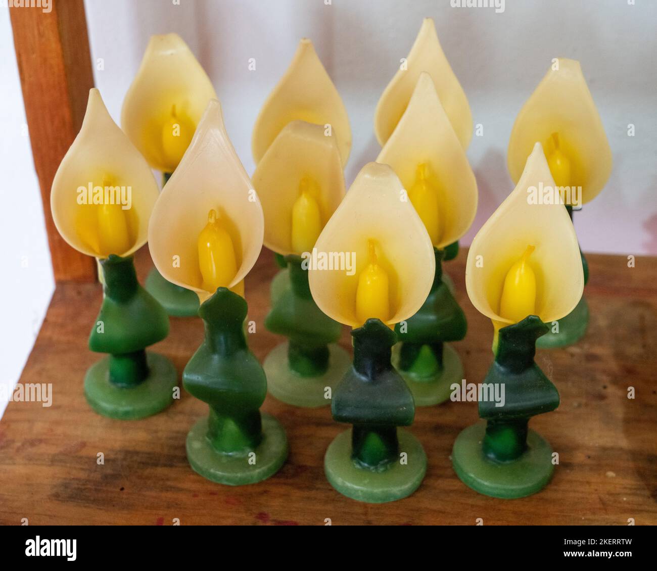 Fancy candles in the shape of calla lilies made by hand in a candle