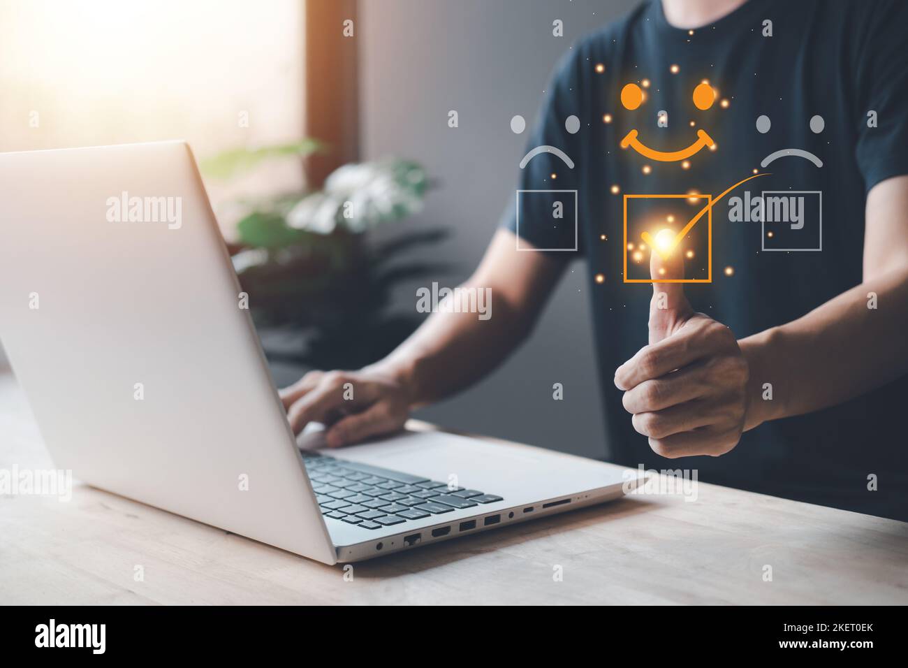 Reviews smile rating with businessman hand touch and typing notebook