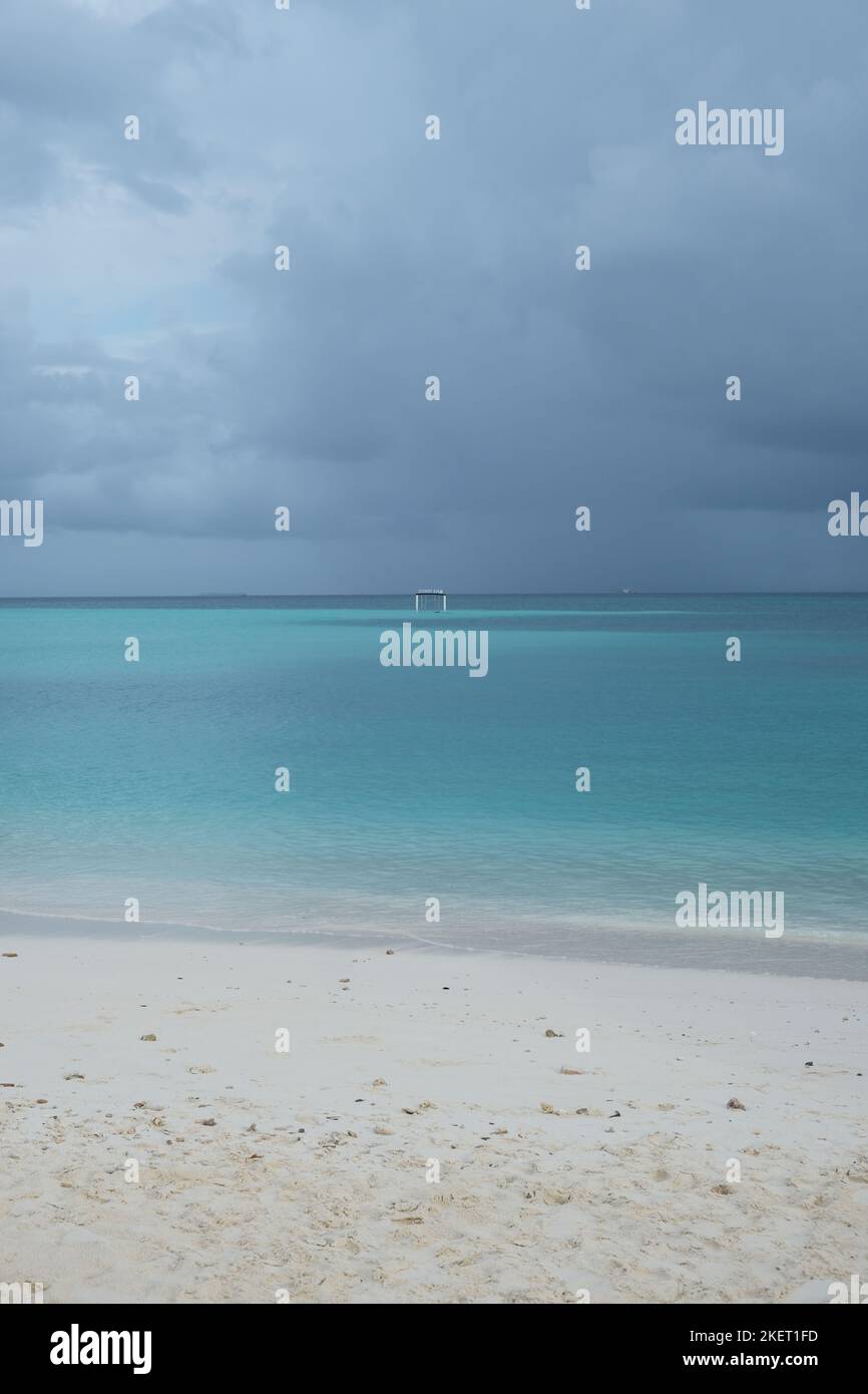 Beautiful beach of Fulidhoo, Maldives during raining season, with ...