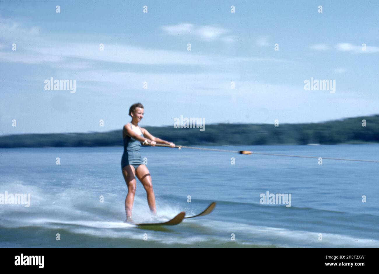 A slim young woman water skiing 1954 Photo by Tony Henshaw Archive
