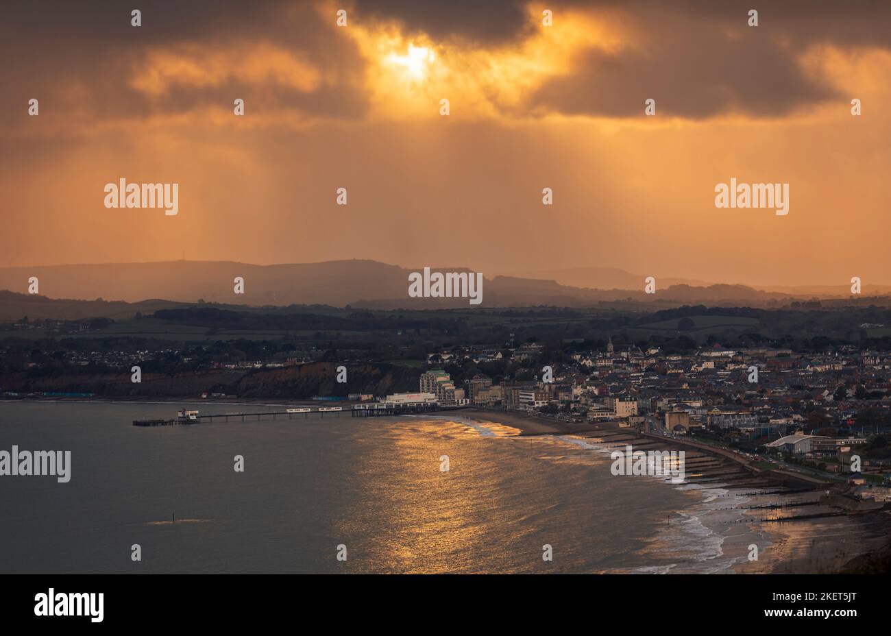 Stormy sunset view of Sandown seafront from Culver Down Isle of Wight south east England Stock Photo