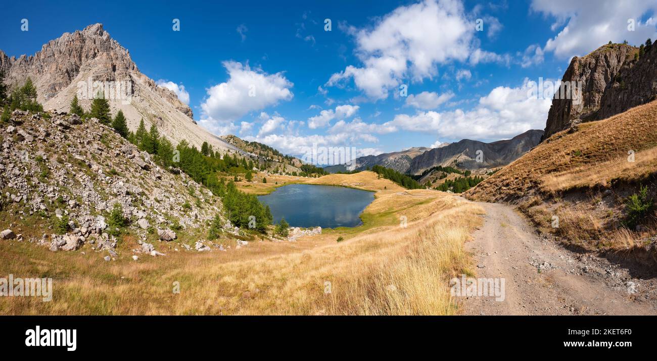 Panoramic summer view from Col du Lauzet and its lake above the village of Saint-Crepin. Hautes-Alpes, Alps, France Stock Photo