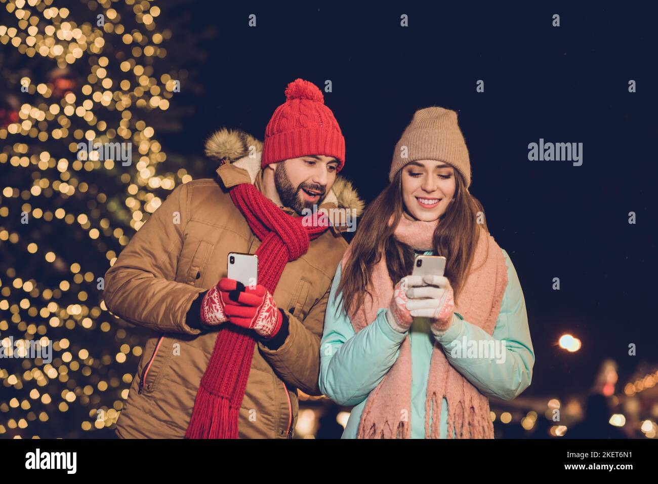 Photo of charming pretty girlfriend boyfriend buying presents modern