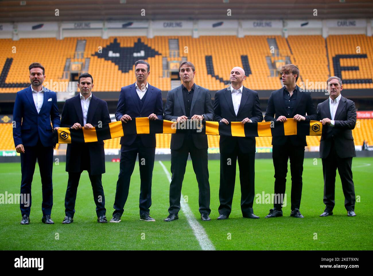 Wolverhampton Wanderers manager Julen Lopetegui (centre) and coaching staff Juan Peinado (third right) and Pablo Sanz (third left) pose for a photo on the pitch after a press conference at the Molineux Stadium, Wolverhampton. Picture date: Monday November 14, 2022. Stock Photo