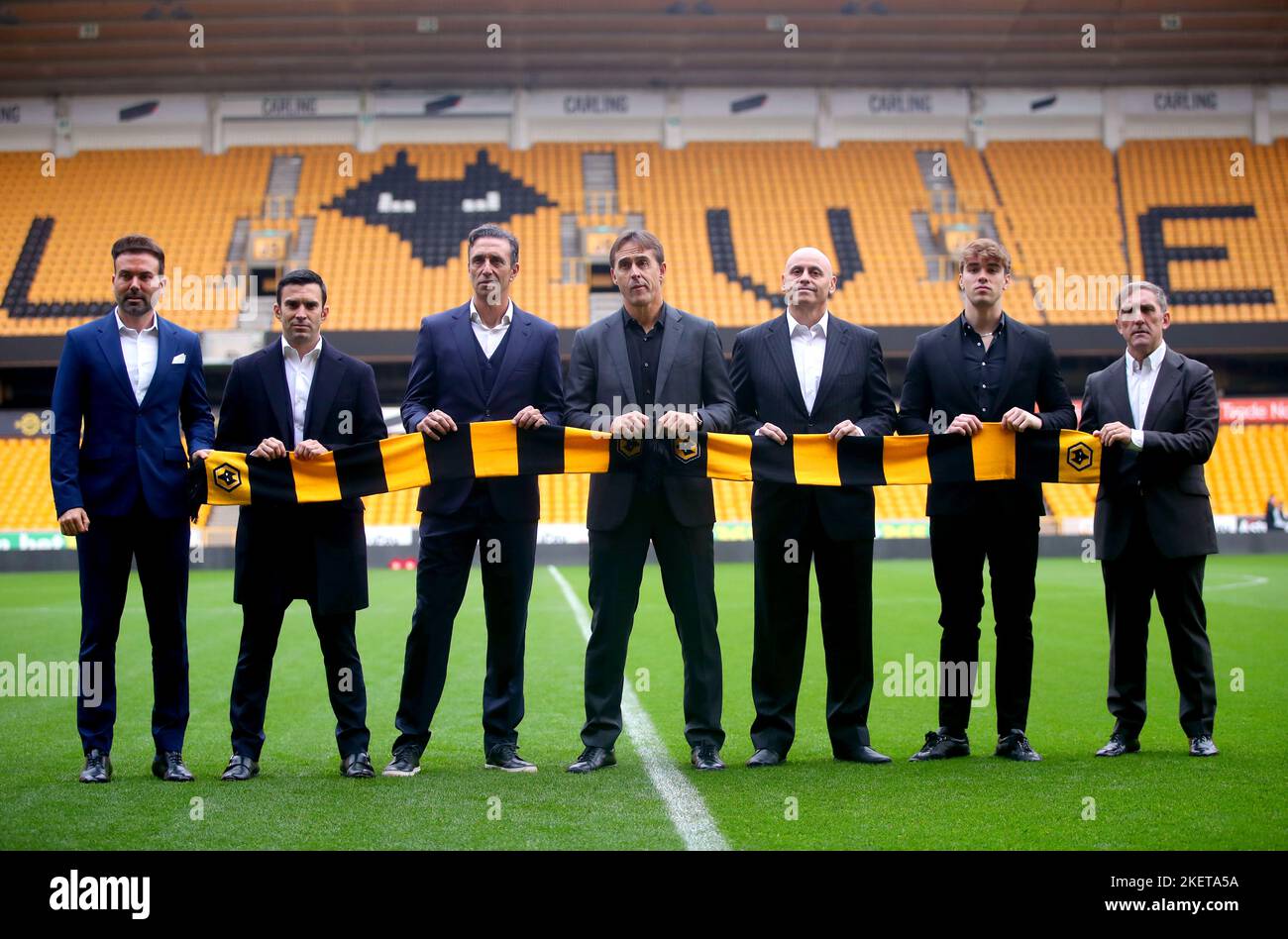 Wolverhampton Wanderers manager Julen Lopetegui (centre) and coaching staff Juan Peinado (third right) and Pablo Sanz (third left) pose for a photo on the pitch after a press conference at the Molineux Stadium, Wolverhampton. Picture date: Monday November 14, 2022. Stock Photo