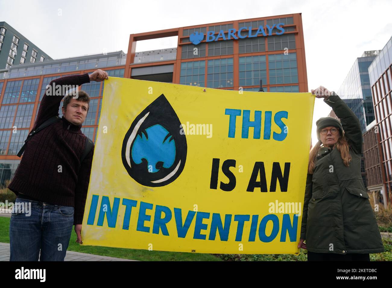 Members from Extinction Rebellion Scotland protesting outside Barclays Clyde Place Quay branch in Glasgow as they demand Barclays cut its ties with fossil fuel firms. The protest is part of Extinction Rebellion and Money Rebellion's UK-wide Better without Barclays campaign of disruption. Picture date: Monday November 14, 2022. Stock Photo