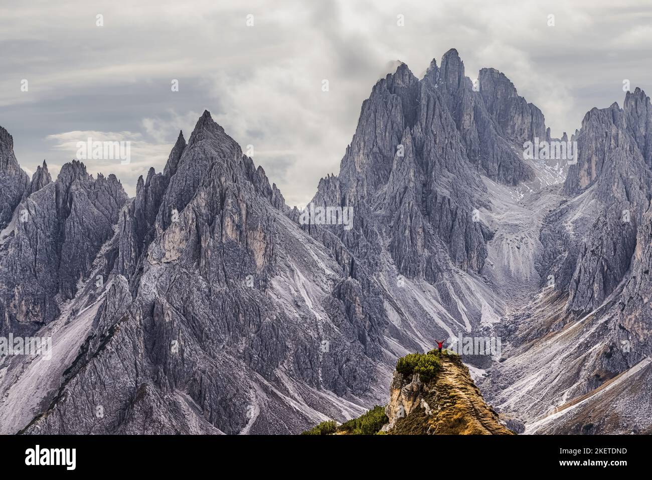 The peaks of Cadini di Misurina feel like they almost create an amphitheater in this spot in the Tre Cime Natural Park. Standing in front of these mag Stock Photo