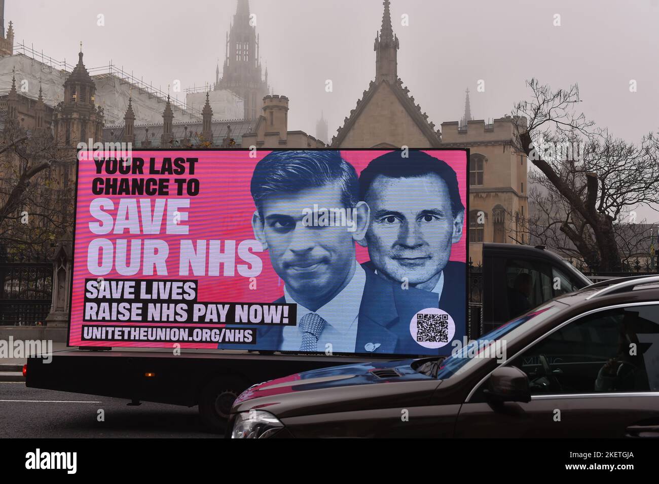 London, 14th Nov 2022. A van carries a digital billboard with a picture of Prime Minister Rishi Sunak and Chancellor Jeremy Hunt by Unite The Union, which reads Save Our NHS, seen near Houses Of Parliament. Credit: Thomas Krych/Alamy Live News Stock Photo