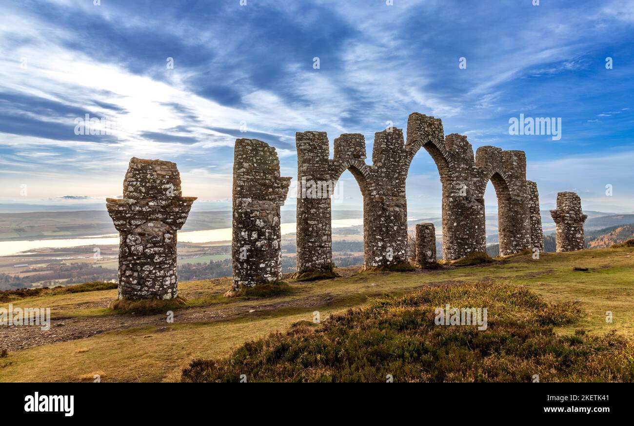 Fyrish Monument Alness Scotland three arches and pillars overlooking the Cromarty Firth in autumn Stock Photo