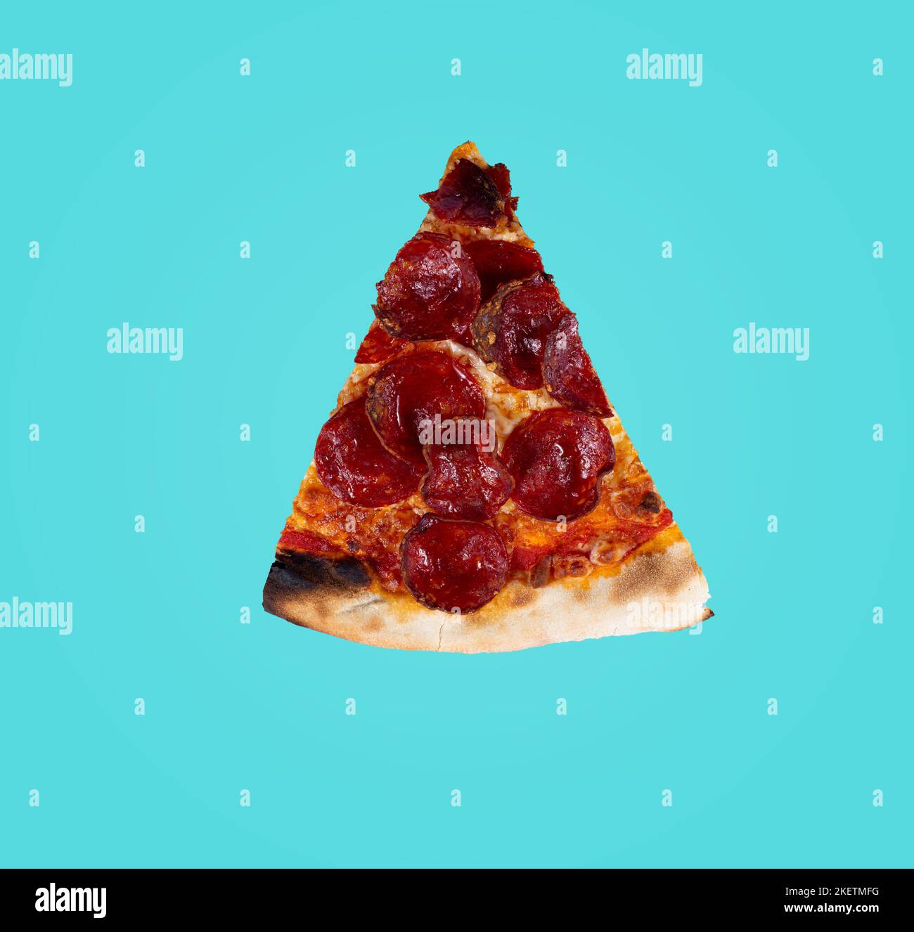 Slice of pizza salami. Pizza with pepperoni salami. Top view Stock