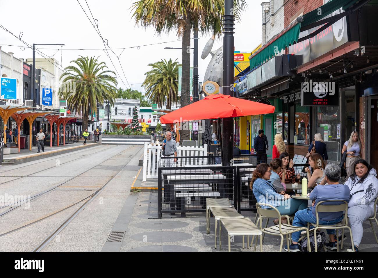 St Kilda beachside suburb in Melbourne Victoria, people eating and