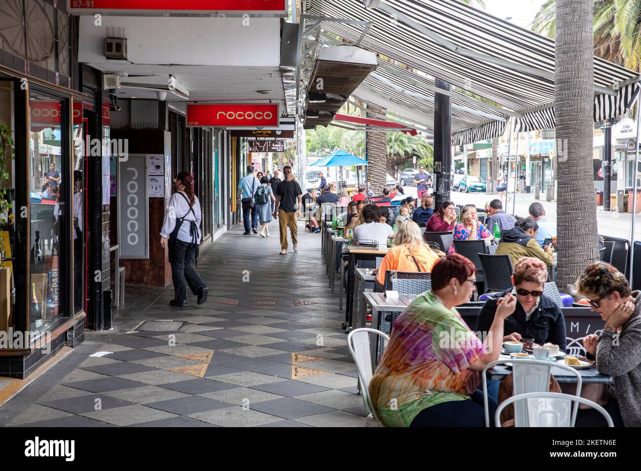 St Kilda beachside suburb in Melbourne Victoria, people eating and
