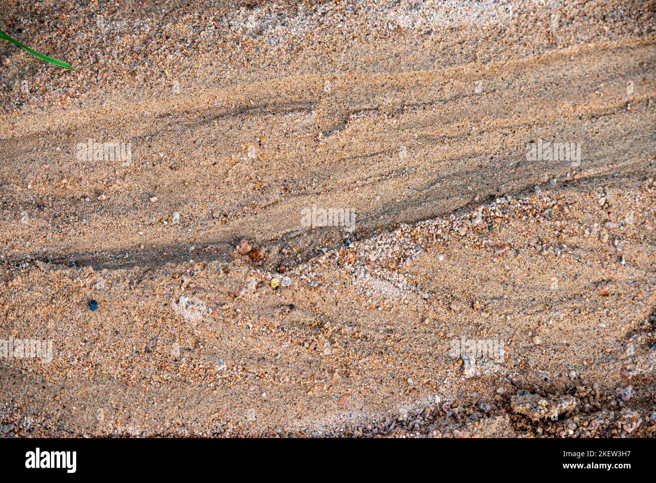 Sand gravel with rainwater drainage marks Stock Photo Alamy