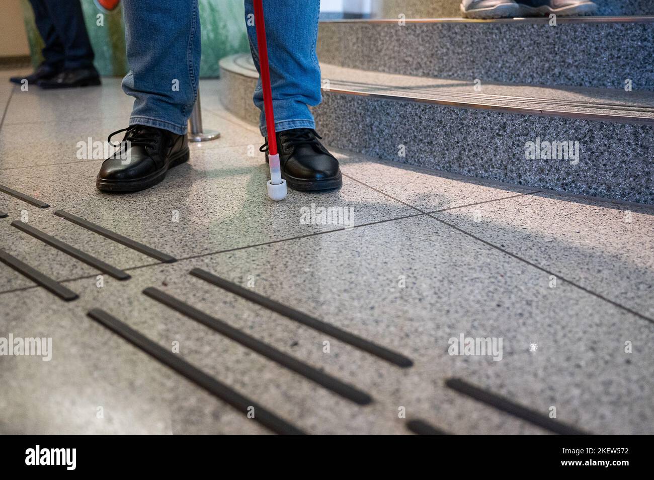14 November 2022, Saxony, Görlitz A blind person with a long cane