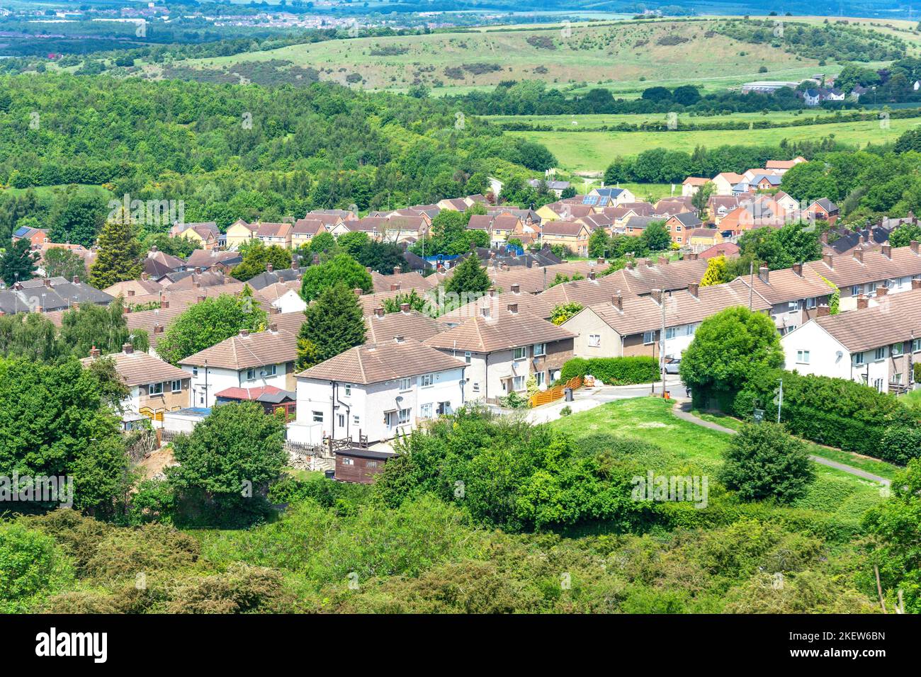 Encroaching green built up housing expansion view of houses surr hires