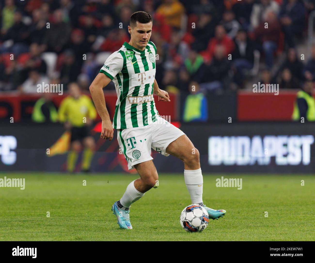 Amer Gojak of Ferencvarosi TC tries to control the ball in front