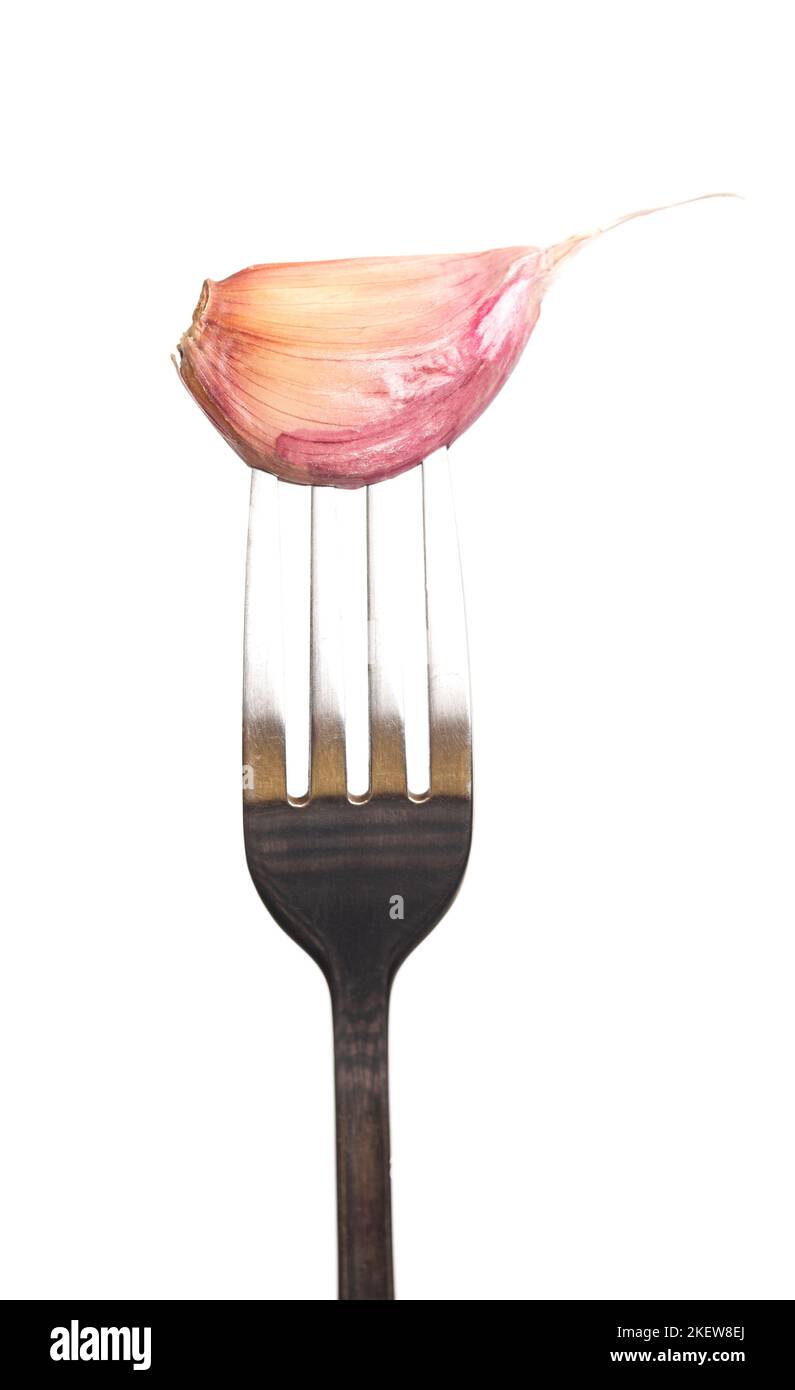Garlic clove on fork hi-res stock photography and images - Alamy