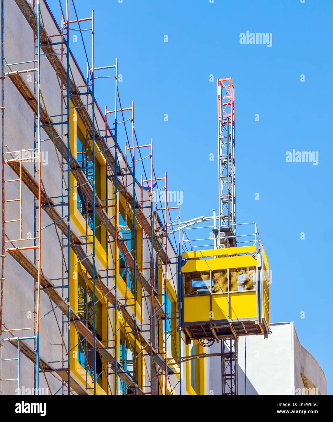 Construction elevator cabin for lifting workers Stock Photo