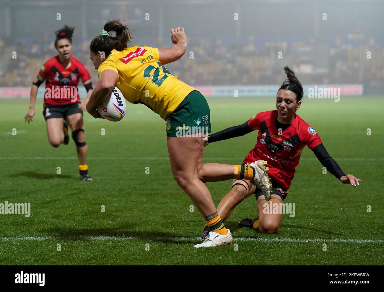 Australia's Evania Pelite gets past Papua New Guinea's Anika Butler ...