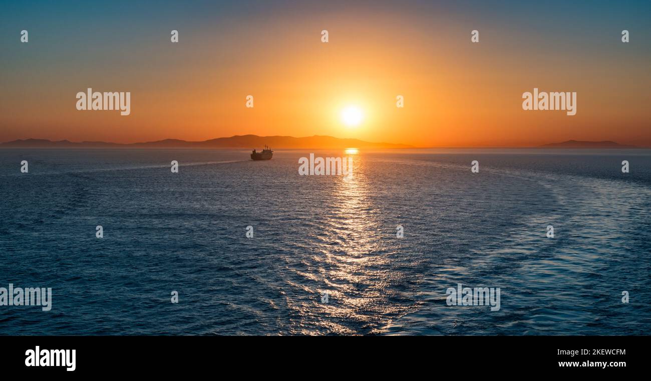 Sunset over the sea. Panoramic seascape. Stock Photo