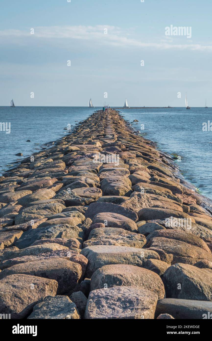 Summer in Parnu stone jetty Estonia Stock Photo