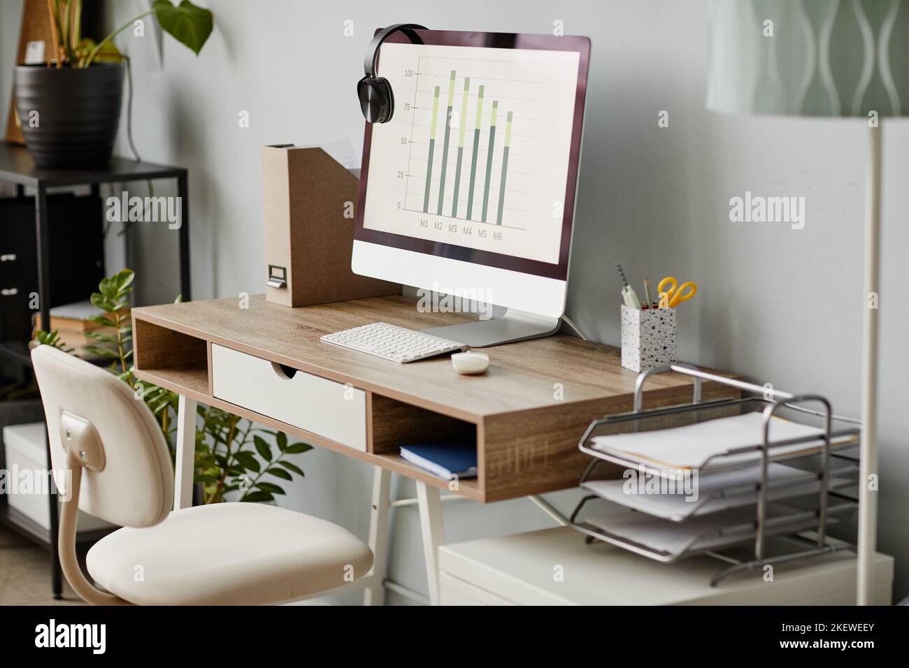 Background image of home office workplace in white with PC computer on wooden desk, copy space Stock Photo