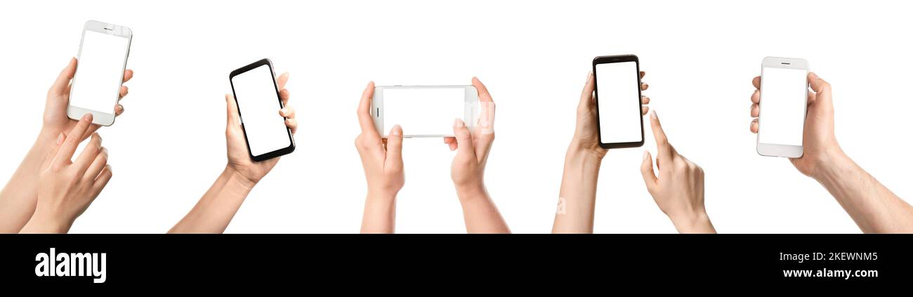 Collection of hands holding mobile phones with blank screens on white ...