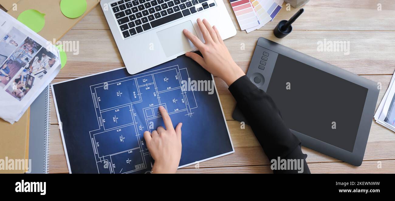 Interior designer working in office, top view Stock Photo - Alamy