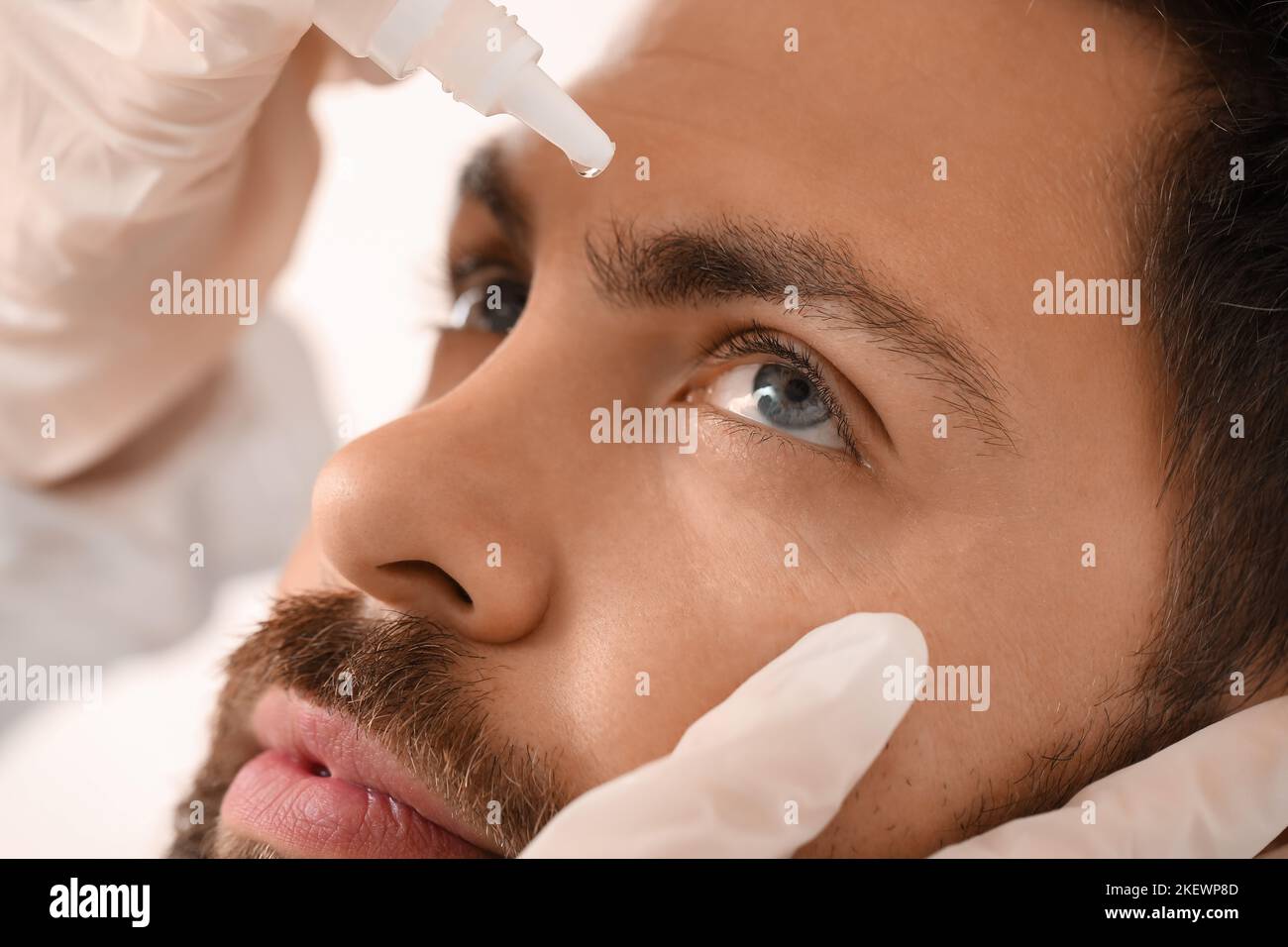 Man Putting Eye Drops In His Eyes Hi res Stock Photography And Images Man Putting Eye Drops In His Eyes Hi res Stock Photography And Images