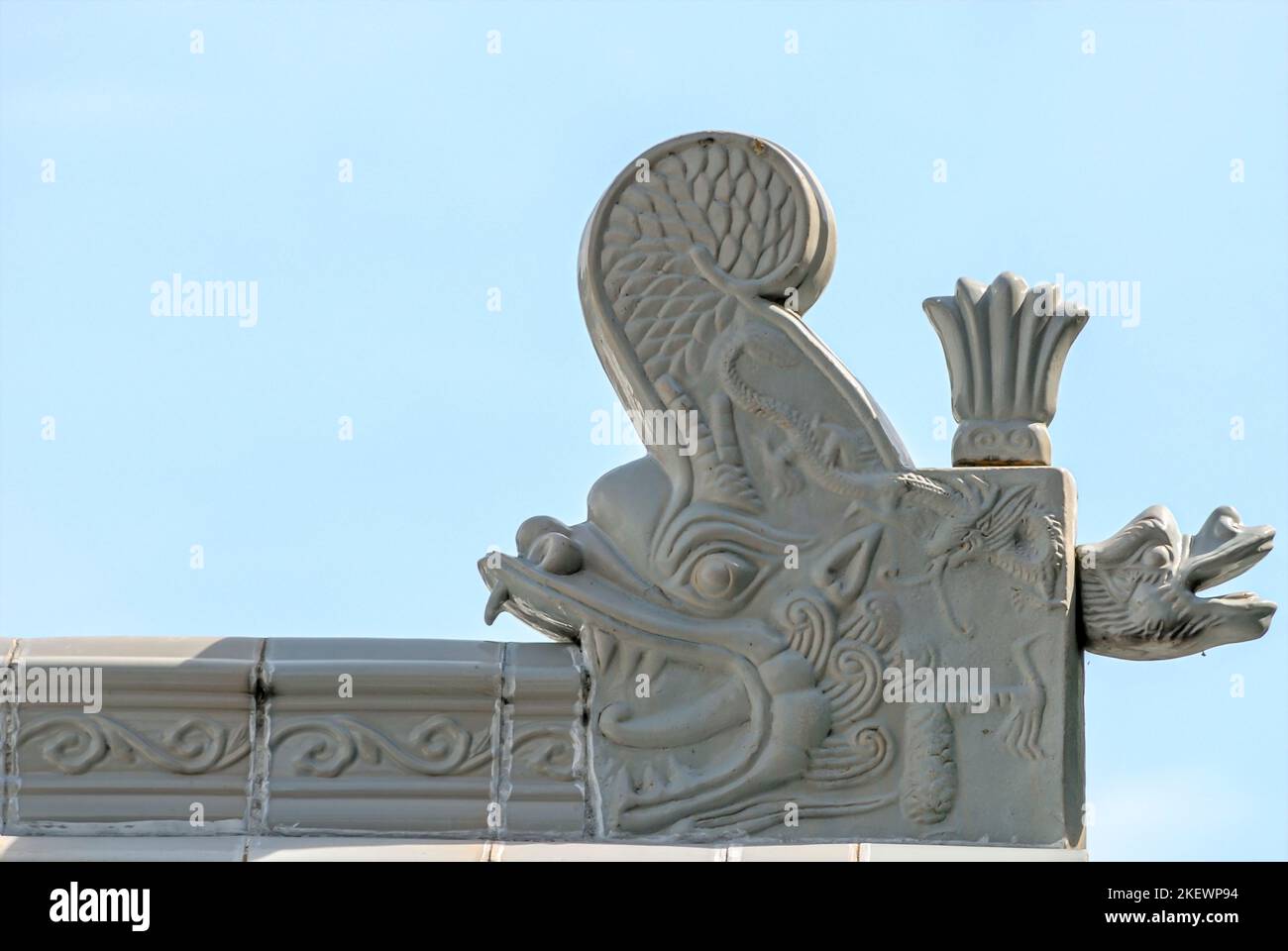 Closeup of a Chinese ceramic roof tile at a Buddhist Temple in Singapore Stock Photo