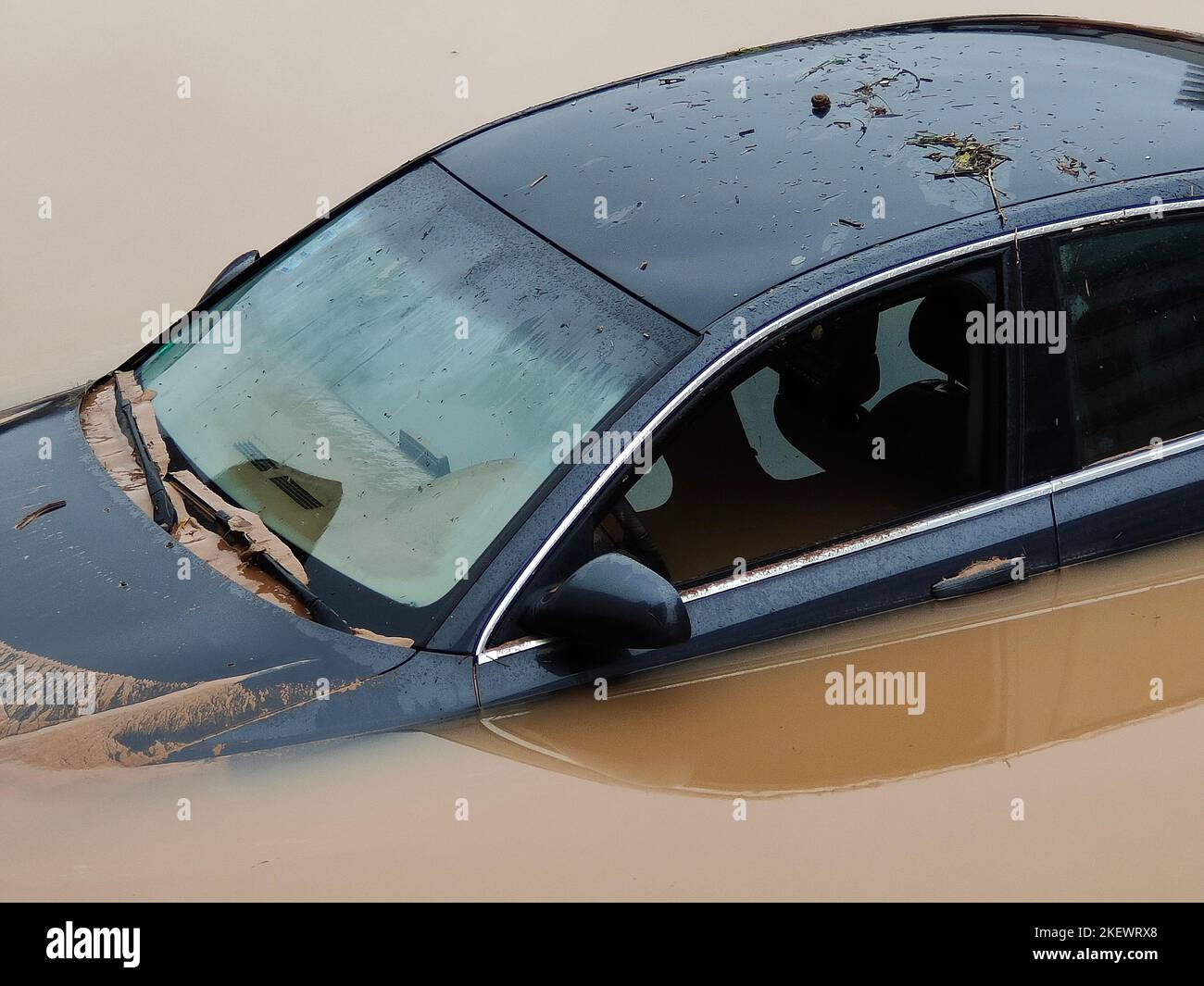 Torrential rain causes flash floods in the city area. Cars under water