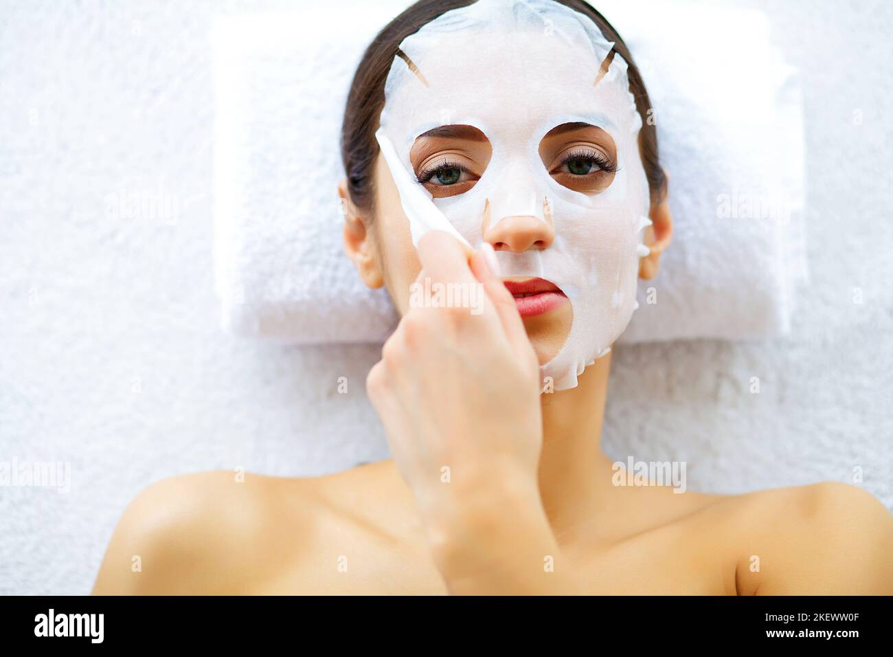 Beauty and Care. Beautiful Young Girl with Mask on Face. Beauty Stock