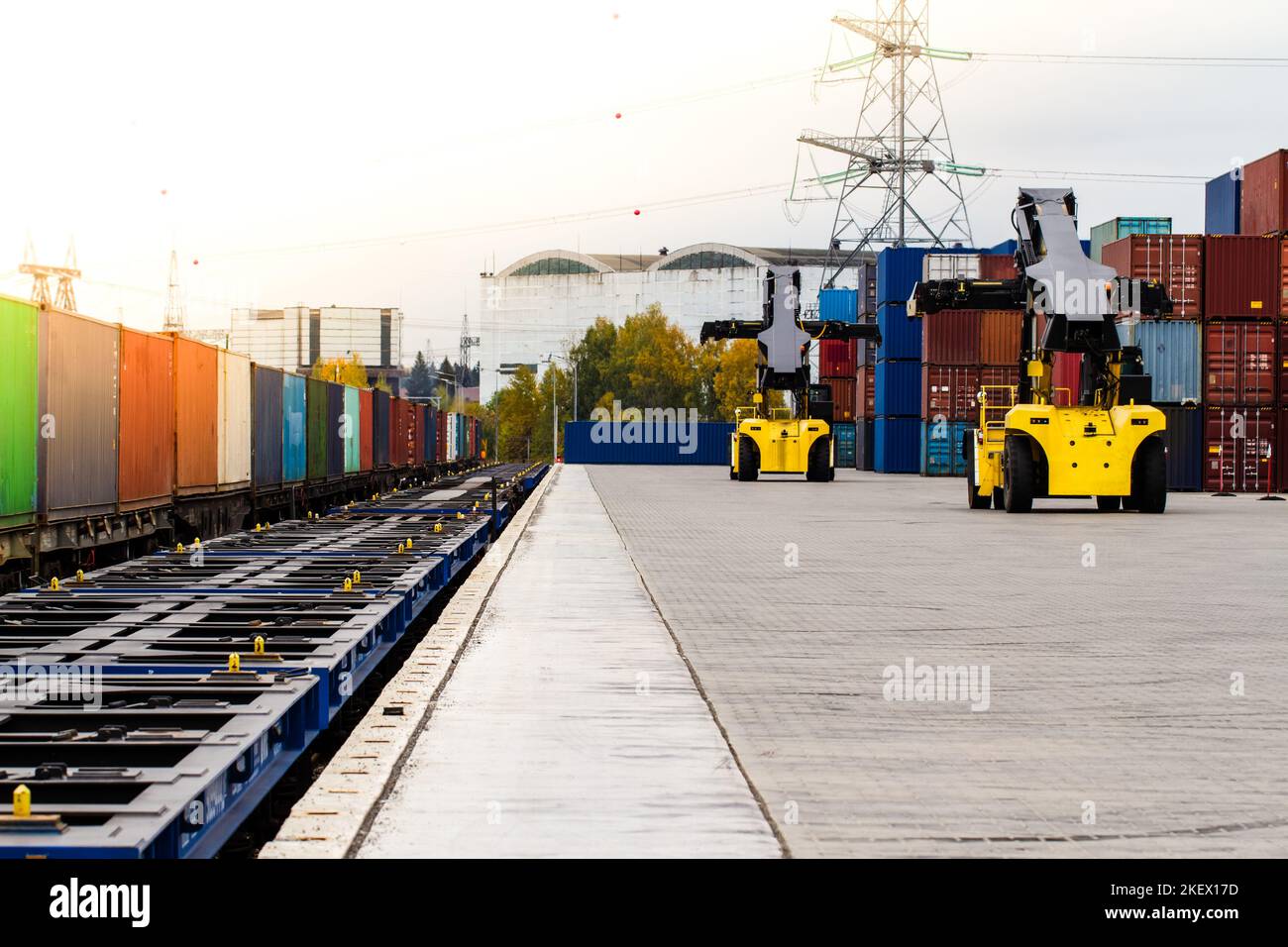 Freight train. Cargo containers transportation by railway. Impoert export logistics concept. Shipping by train. Cargo train platform. Stock Photo