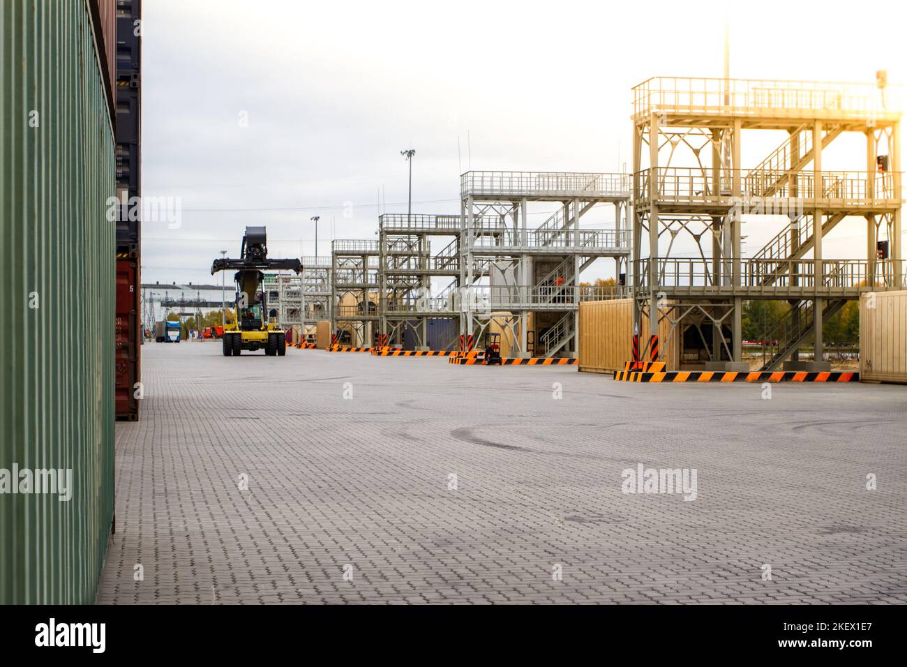 Stacked freight shipping containers and refrigerators. Refrigerated containers. Stacked containers in a shipping terminal Stock Photo