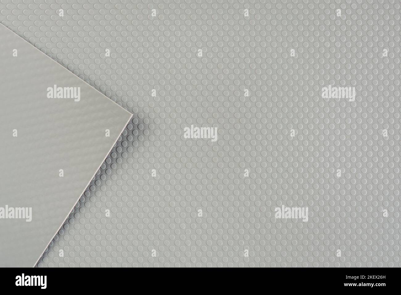 Antislip mat for kitchen furniture drawers. The texture of a rubber