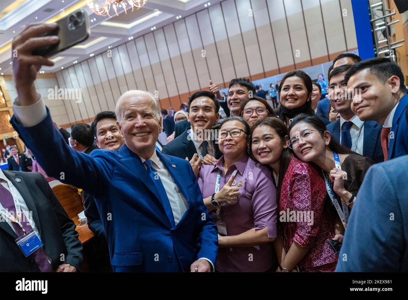 Phnom Penh, Cambodia. 13th Nov, 2022. U.S. President Joe Biden, takes a selfie Cambodian alumni from the Young Southeast Asian Leaders Initiative during a gathering on the sidelines of the ASEAN Summit, November 13, 2022, in Phnom Penh, Cambodia. Credit: Adam Schultz/White House Photo/Alamy Live News Stock Photo