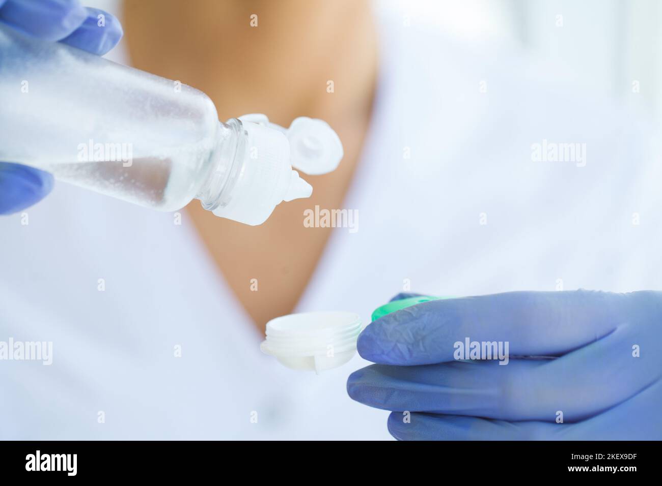 Vision And Medicine Concept. Young Girl Holds Eye Drops In Hands