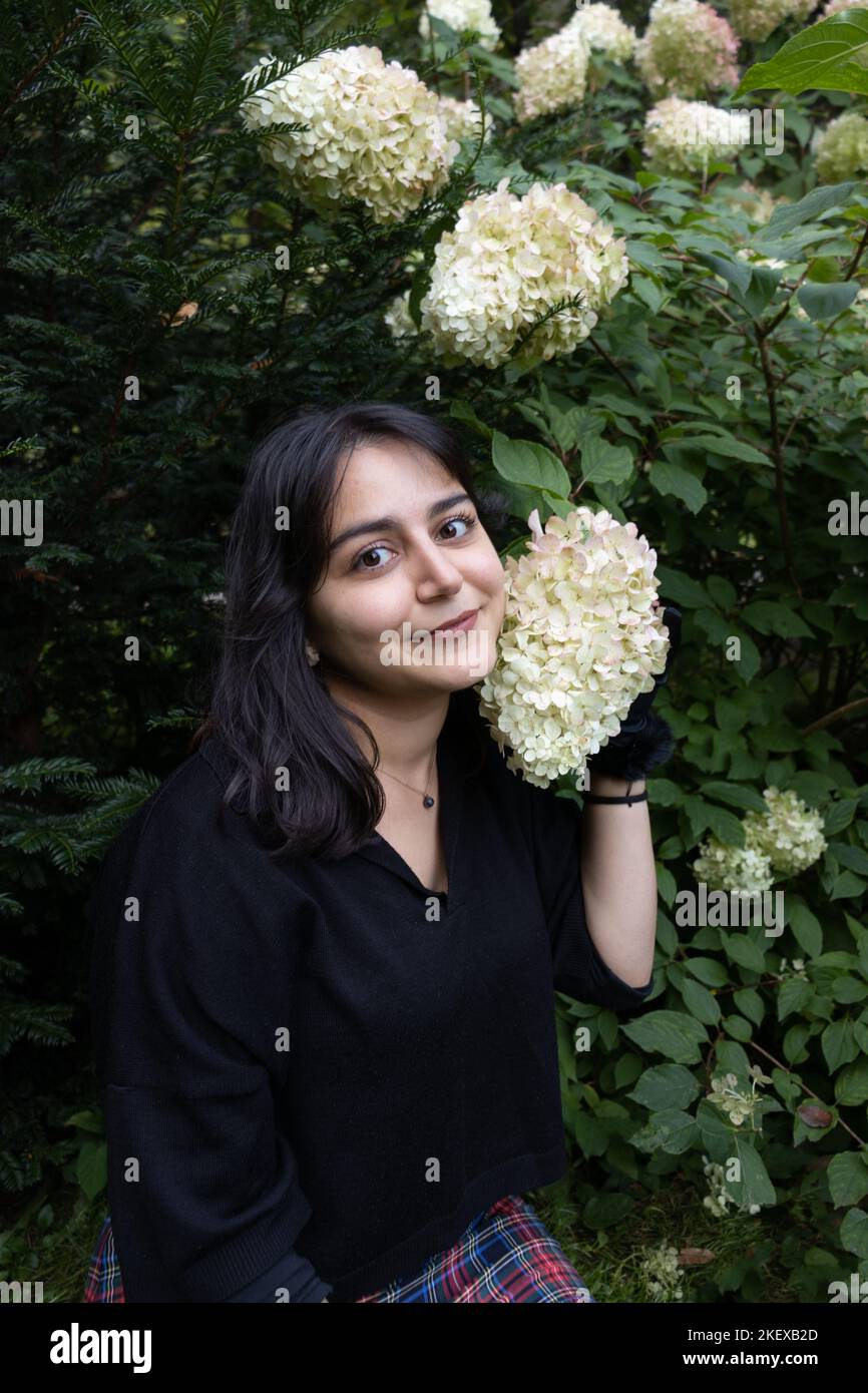 portrait of a woman with flowers Stock Photo