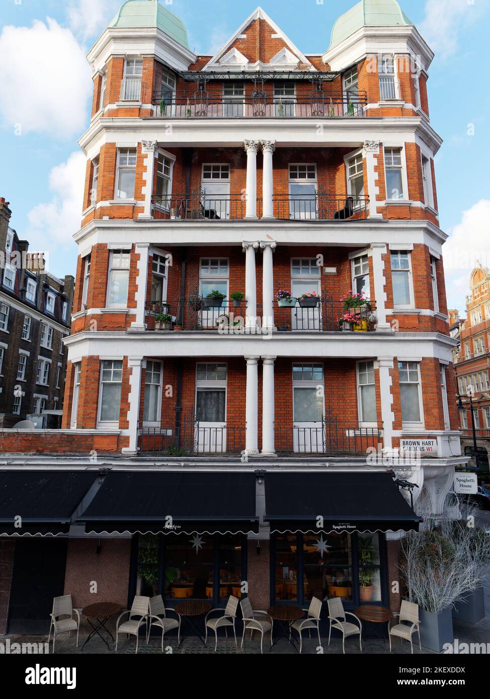 Beautiful apartments with balconies overlooking Brown Hart Gardens, with restaurant below, near Duke Street, Mayfair, London Stock Photo