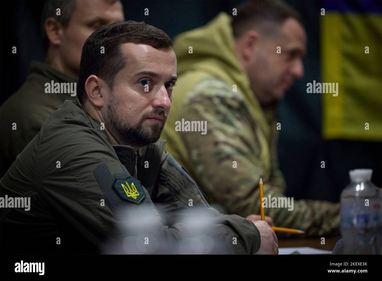 Mykolaiv, Ukraine. 14th Nov, 2022. Deputy Head of the Office of the President of Ukraine Kyrylo Tymoshenko, left, listens during a meeting on stabilizing the humanitarian situation following the liberation of Mykolaiv and Kherson regions, November 14, 2022 in Mykolaiv, Ukraine. Credit: Ukraine Presidency/Ukrainian Presidential Press Office/Alamy Live News Stock Photo