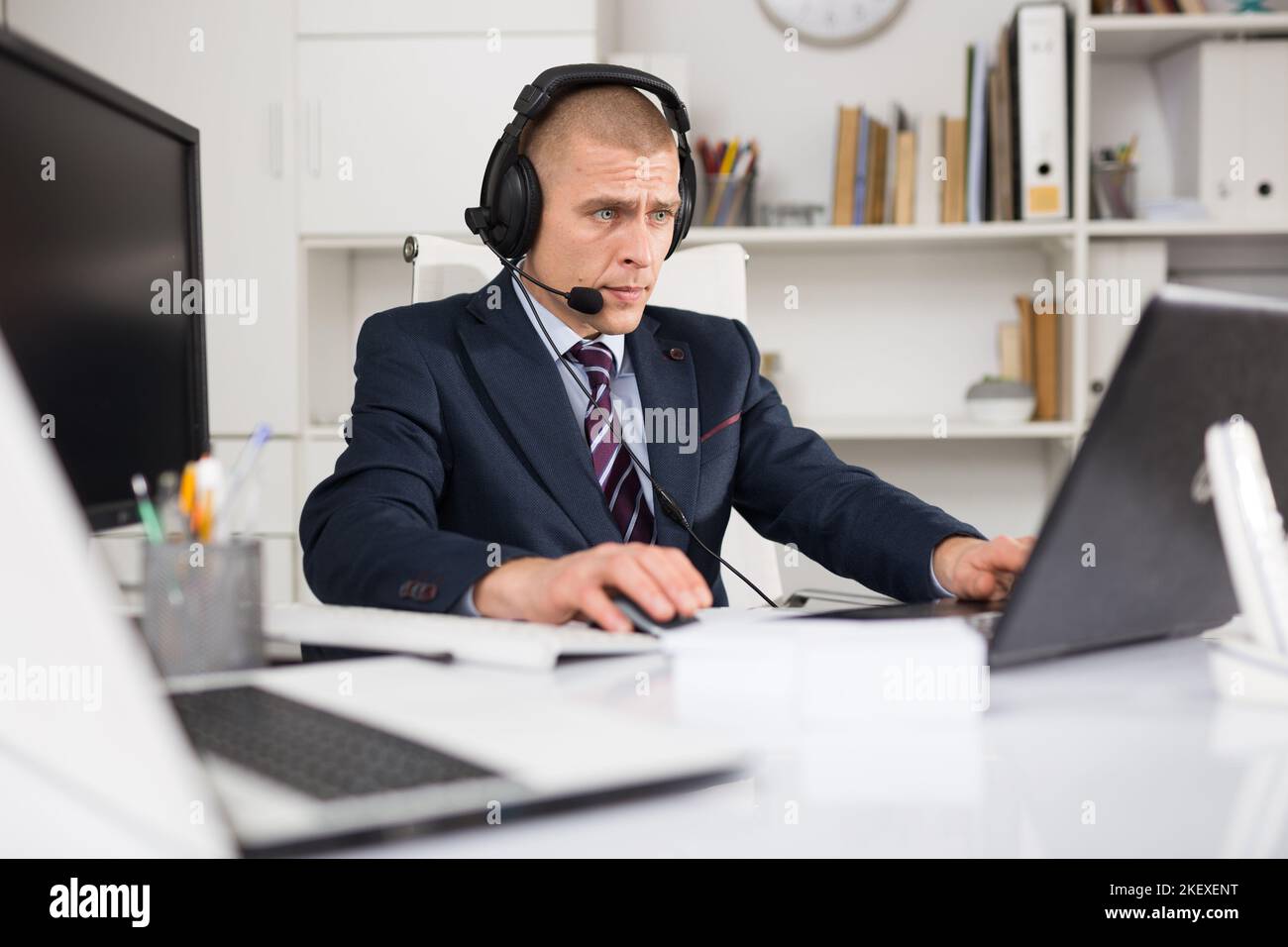 Call center man microphone earphones hi-res stock photography and ...