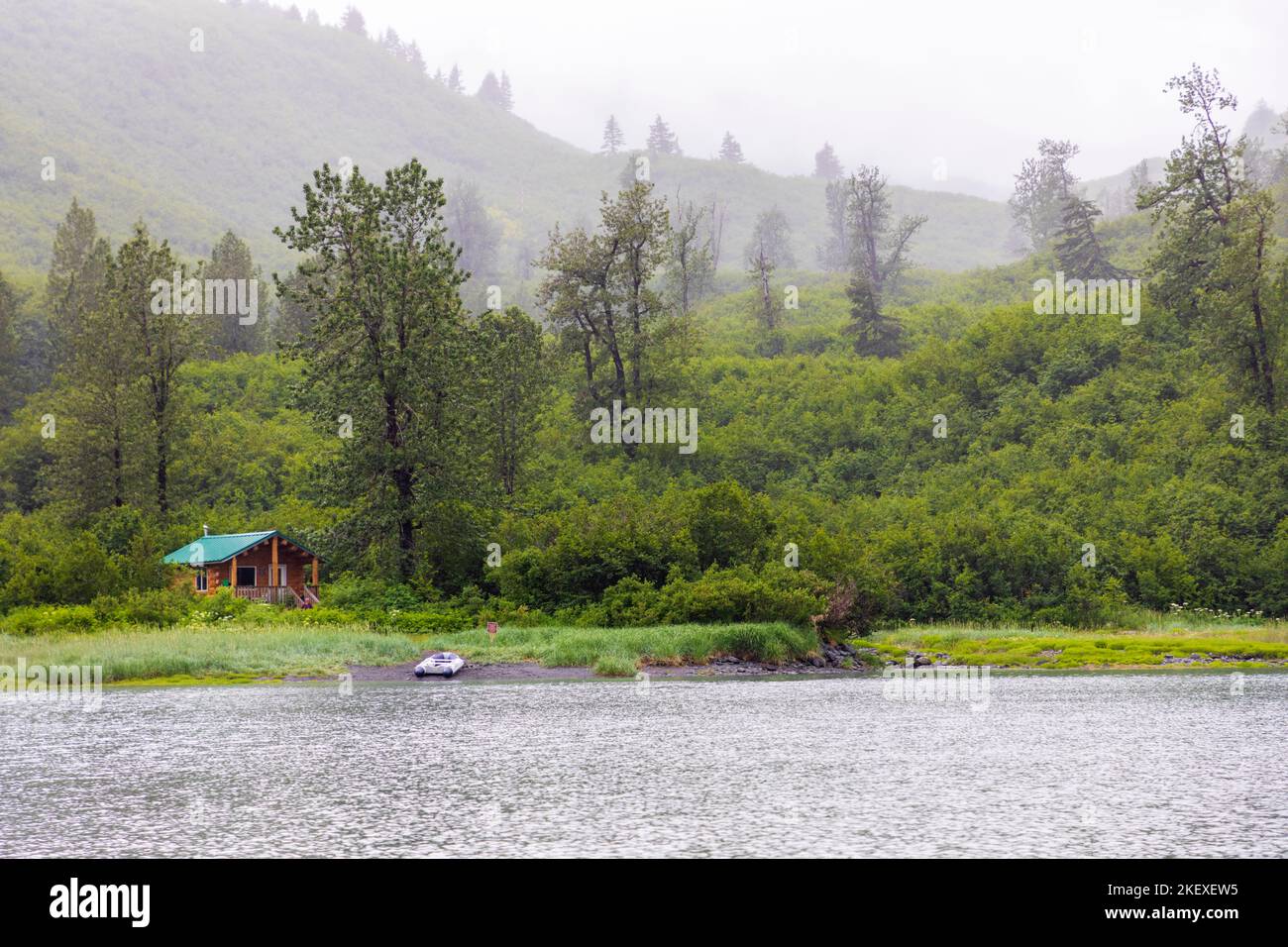 Remote wilderness log cabin; Shoup Bay; Valdez Arm; Prince William Sound; Alaska; USA Stock Photo