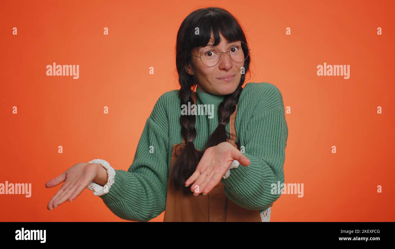 Woman raising hands asking what why reason of failure demonstrating ...