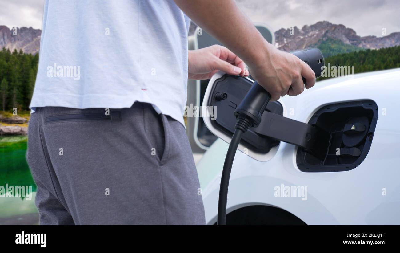 installing-electric-vehicle-charger-hi-res-stock-photography-and-images