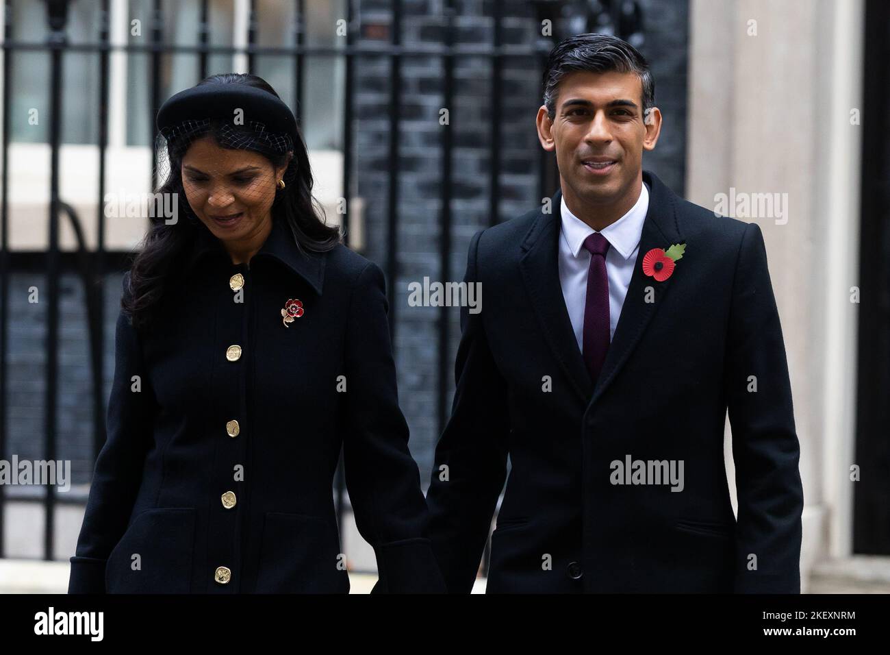 London, UK. 13th Nov, 2022. Akshata Murthy and Rishi Sunak walk through Downing Street to attend the Remembrance Sunday Service at the Cenotaph in London. Credit: SOPA Images Limited/Alamy Live News Stock Photo